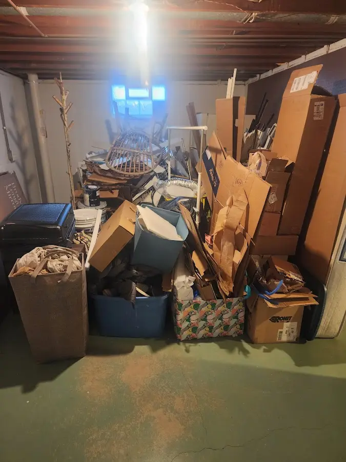 Roll-off dumpster container at job site for Yard Waste Dumpster Rental in Little Britain